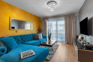 Et tv og/eller underholdning på Apartman Aria De Lux