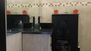 Køkken eller tekøkken på Kumwitu Kingsland