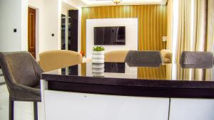 Et tv og/eller underholdning på Kumwitu Kingsland + 14 billeder