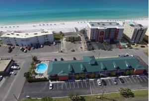 an aerial view of a resort and the beach at Tropical Isle 209 w Convenient Beach Access in Fort Walton Beach +16 photos