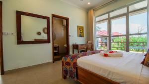 Postel nebo postele na pokoji v ubytování Coral Cliff Villas Zanzibar + 74 fotografií