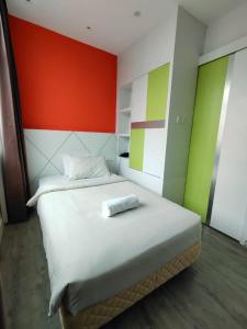 Postel nebo postele na pokoji v ubytování CAPITAL EXPRESS