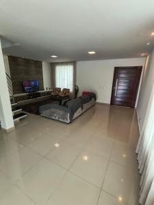 Et opholdsområde på Casa espaçosa em Meaipe