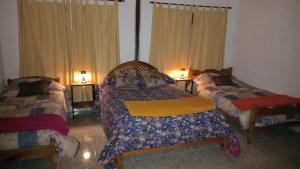 En eller flere senge i et værelse på Las Tres Marias