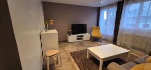 Μια τηλεόραση ή/και κέντρο ψυχαγωγίας στο 3 chambres - Vaulx en Velin