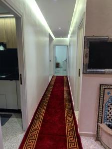 Et tv og/eller underholdning på Appartement a Oulad Mtaa ,Prés du stade Moulay Abdallah,Rabat