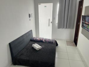 Et opholdsområde på Apartamento Garagem Compacta 09