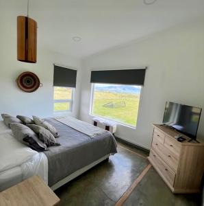 Una cama o camas en una habitación de Casa Bella Vista