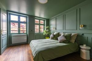 Postel nebo postele na pokoji v ubytování Central Cosy 22