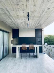 Et tv og/eller underholdning på Casa lujosa en Tanti