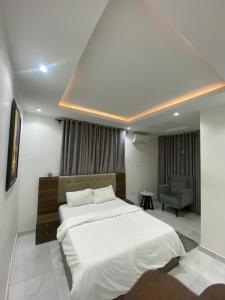 Postel nebo postele na pokoji v ubytování Elite Luxe + 13 fotografií