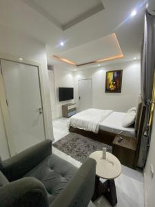 TV a/nebo společenská místnost v ubytování Elite Luxe