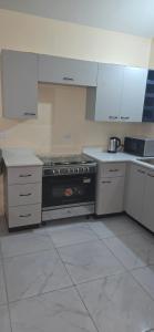 Kuchyň nebo kuchyňský kout v ubytování Cozy bedroom