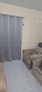 Posezení v ubytování Cozy bedroom