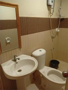 Ванная комната в WJV INN LAHUG