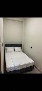 Giường trong phòng chung tại Casa Moderna Premium con Aire Acondicionado y Cine