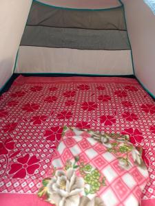 En eller flere senge i et værelse på Midnight pavana camp camping