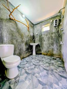 Koupelna v ubytování Thanamal-villa