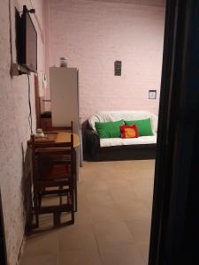 En eller flere senge i et værelse på El Rincón del Capibara Alojamientos