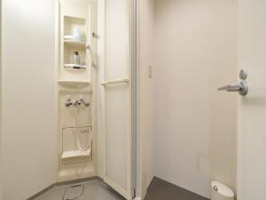 a bathroom with a toilet and a urinal at RetroSpect Stay Yokohama - Vacation STAY 93126v in Yokohama +30 photos