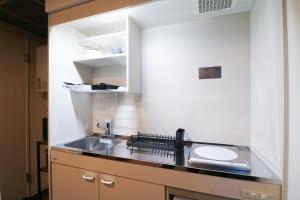 Nhà bếp/bếp nhỏ tại Maison Odori +34 ảnh