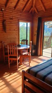 Балкон или терраса в Turismo El Recodo, cabañas y camping