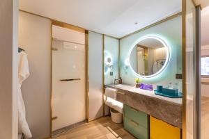 Ένα μπάνιο στο Zhangjiagang Pedestrian Street Manxin Hotel +33 φωτογραφίες