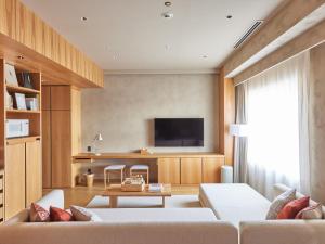 TV a/nebo společenská místnost v ubytování LIBER HOTEL Osaka