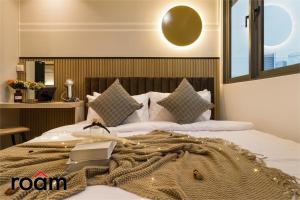 Ένα ή περισσότερα κρεβάτια σε δωμάτιο στο The Riv, Riveria City KL Sentral