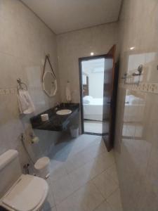 Koupelna v ubytování Apartamento próximo avenida São Domingos + 38 fotografií