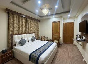 Ένα ή περισσότερα κρεβάτια σε δωμάτιο στο Hotel oscar Mountain Retreat +7 φωτογραφίες