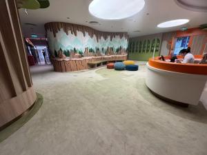a lobby with a waiting room with a desk at A LA CARTE Hạ Long Bay View biển tầng cao in Ha Long +113 photos