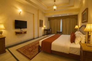 Μια τηλεόραση ή/και κέντρο ψυχαγωγίας στο Shastri Lodge +4 φωτογραφίες