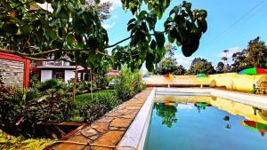 Πισίνα στο ή κοντά στο Kusi Hotel Kakamega