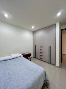 Una cama o camas en una habitación de Hermosa residencia en San Pedro Cholula