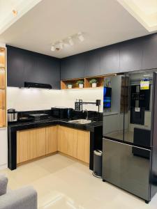 Η κουζίνα ή μικρή κουζίνα στο Aventura Presidential Suite at SMDC Charm Residences +24 φωτογραφίες