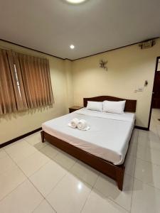 En eller flere senge i et værelse på J Hotel2