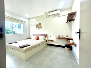 Ένα ή περισσότερα κρεβάτια σε δωμάτιο στο SKY MANSION - Heritage Khmer House +44 φωτογραφίες