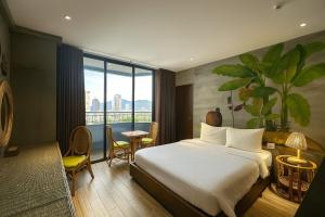 En eller flere senge i et værelse på MissBamboo Hotel Nha Trang + 87 billeder