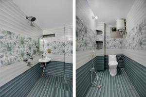 Un baño con suelo azul, inodoro y lavabo. en Super Hotel O Patliputra Railway Station Formerly Rameshwaram Guest House, en Dānāpur