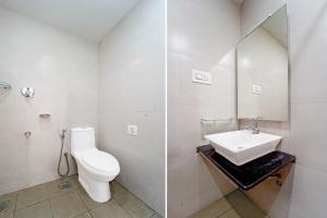 Et badeværelse på Collection O RTO Office Uzhavoor Formerly Hotel Zodiac