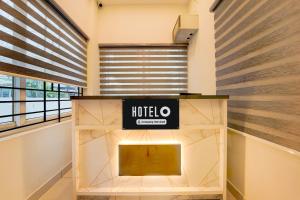 Un certificado, premio, cartel u otro documento en Super Collection O Trivandrum Airport