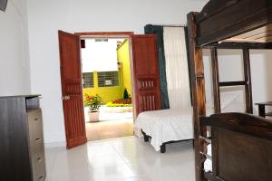 Posteľ alebo postele v izbe v ubytovaní Hotel Abadia