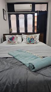 Postel nebo postele na pokoji v ubytování The Nook