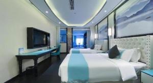 Postel nebo postele na pokoji v ubytování Xana Hotelle·Suzhou Shilu Shantang Street Scenic Spot