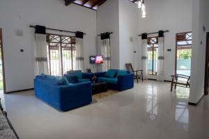 Un lugar para sentarse en Sunset Reef Villa