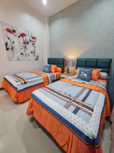 En eller flere senge i et værelse på Alice pool villa in Krabi