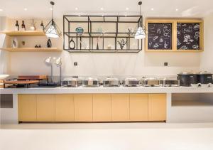 Η κουζίνα ή μικρή κουζίνα στο City Comfort Inn Kunshan Development Zone Penglang Xinxing Middle Road