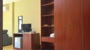 TV a/nebo společenská místnost v ubytování Sakura Hotel