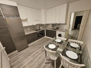 Kuchyň nebo kuchyňský kout v ubytování Lappi